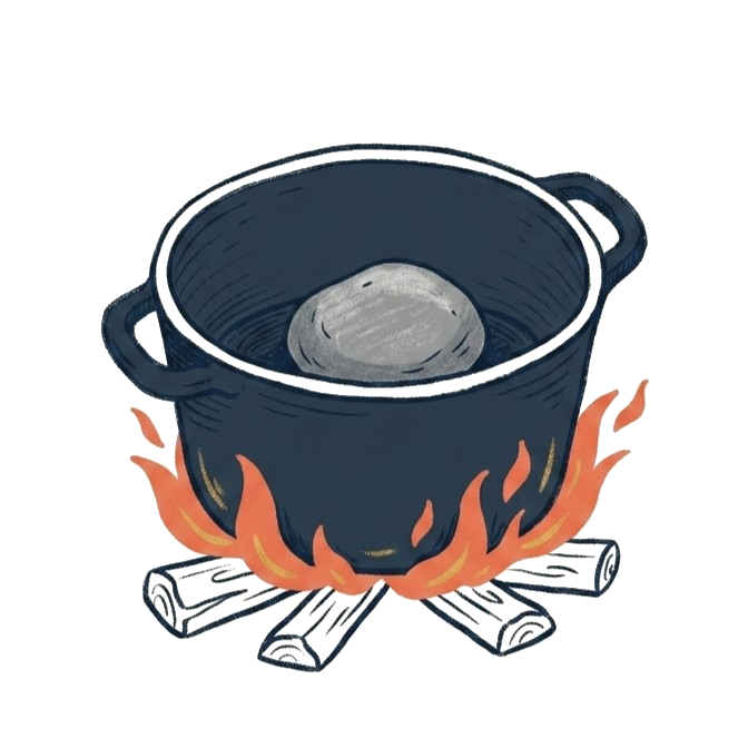 A small cooking pot with a rock inside, sitting over a fire